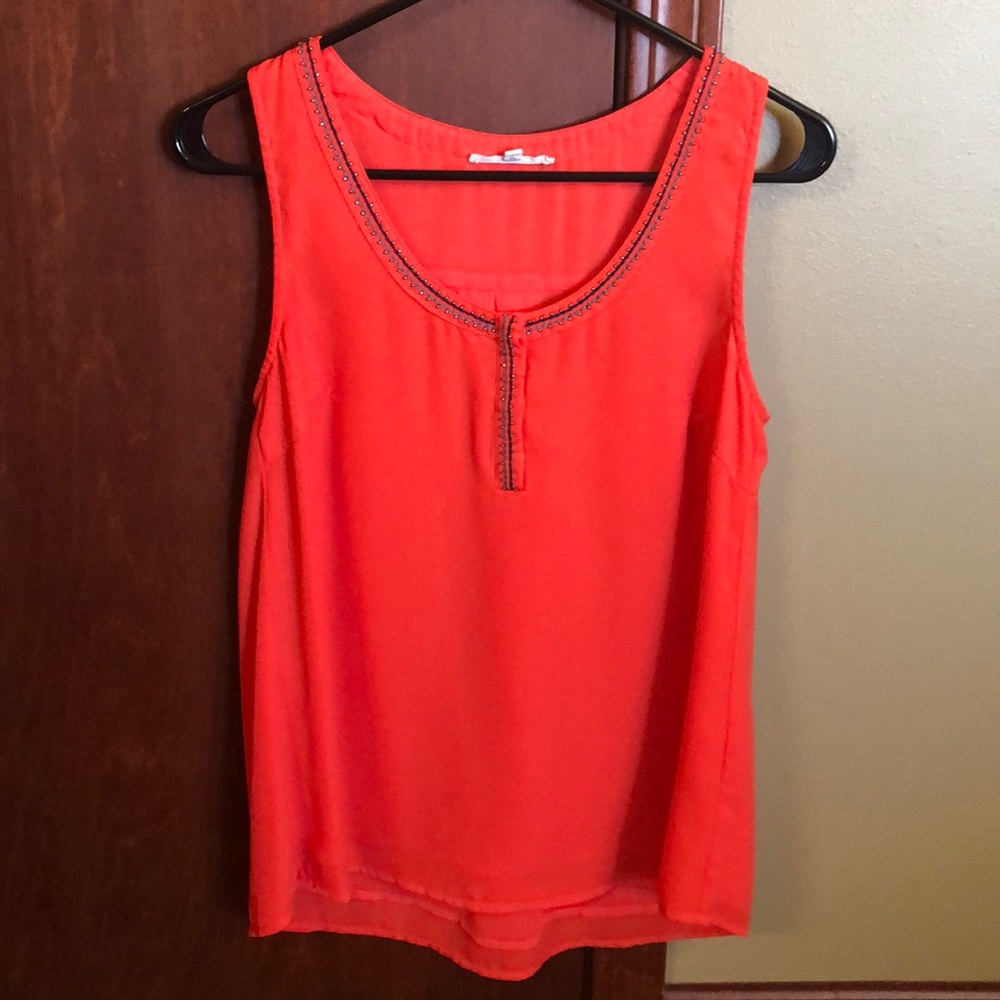 Melon colored tank.